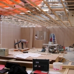 Opbouw van de Mock-up ruimte - In een loods is het geraamte aangebracht van de proefwinkel